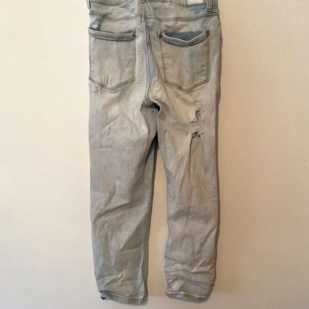 Straight leg ripped dollhouse jeans. Skate and street style jeans